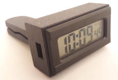 Uhr-Modul, im Halter befindlich